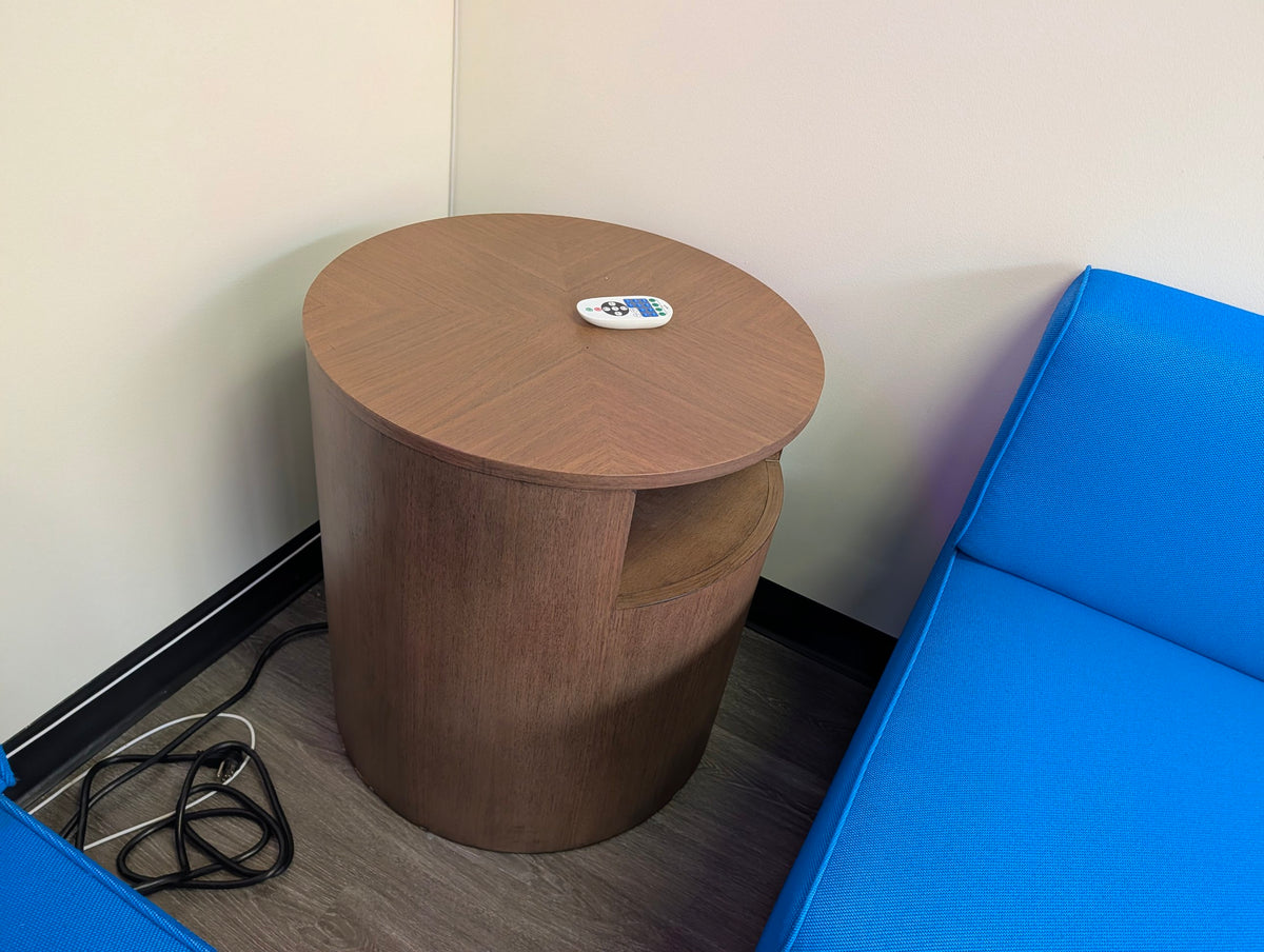 Round walnut drum side table with open cubby