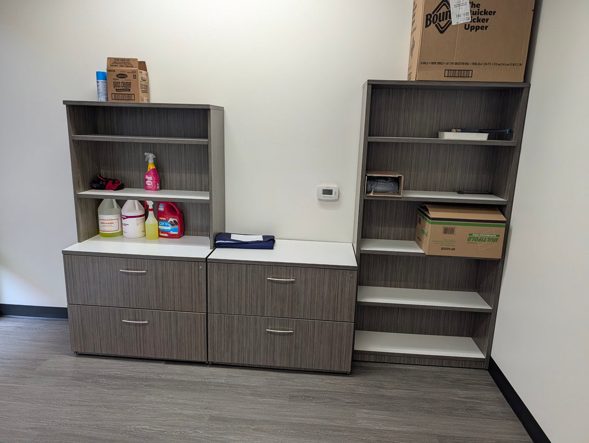 Grey woodgrain lateral files, hutch, and tall bookcase