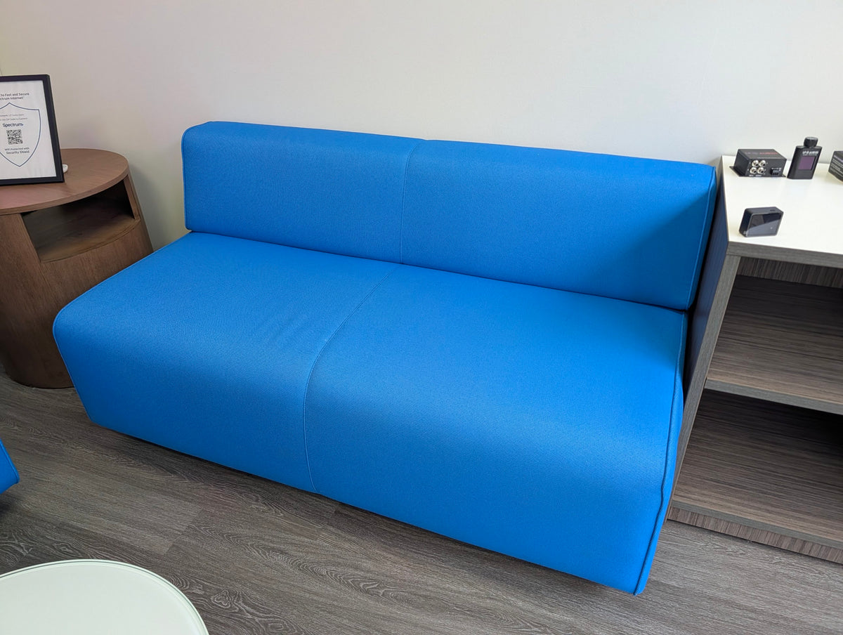 Blue armless lounge loveseat, clean