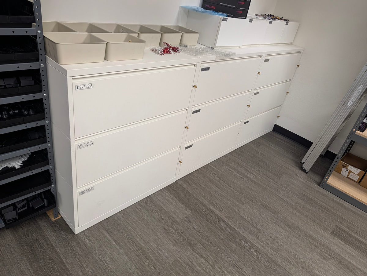Row of Meridian white lateral file cabinets