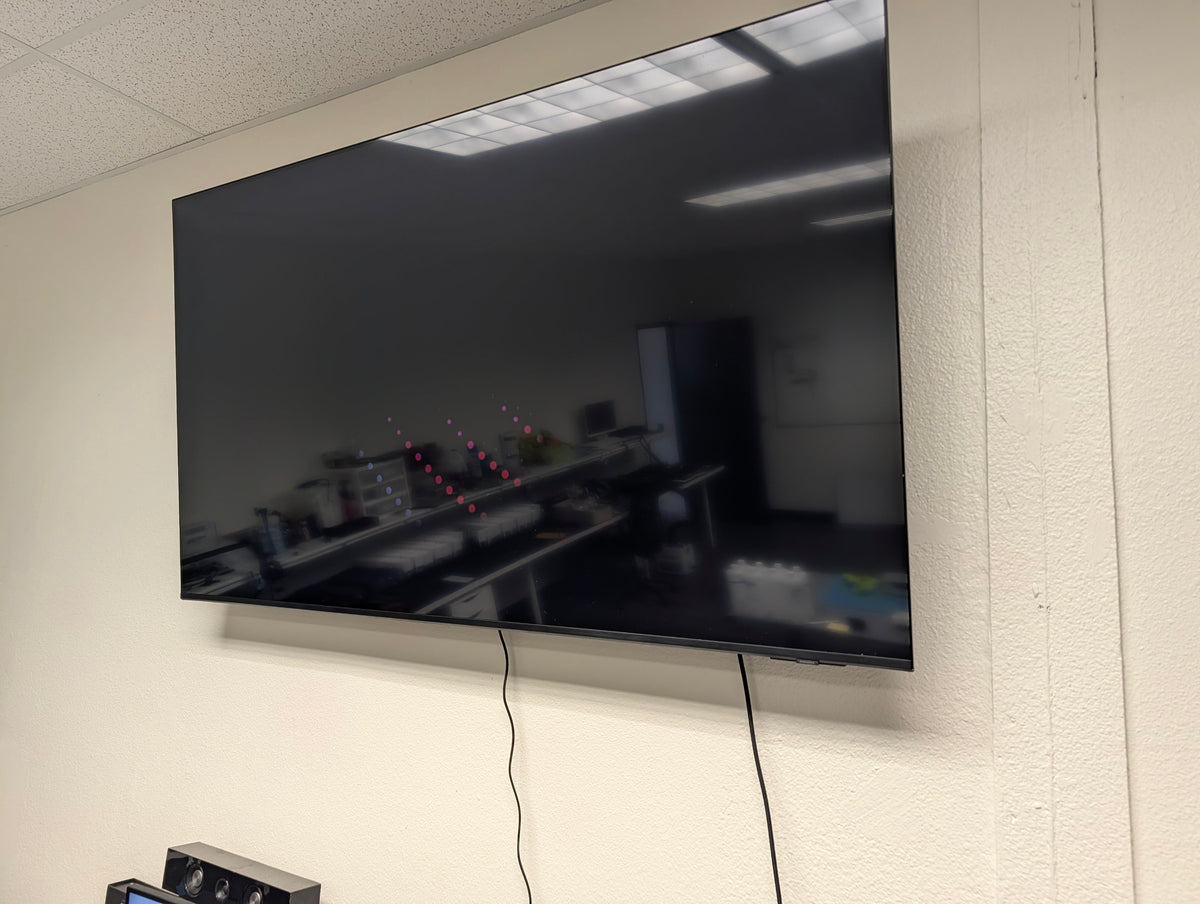 Samsung 65 inch Crystal UHD TV mounted on wall
