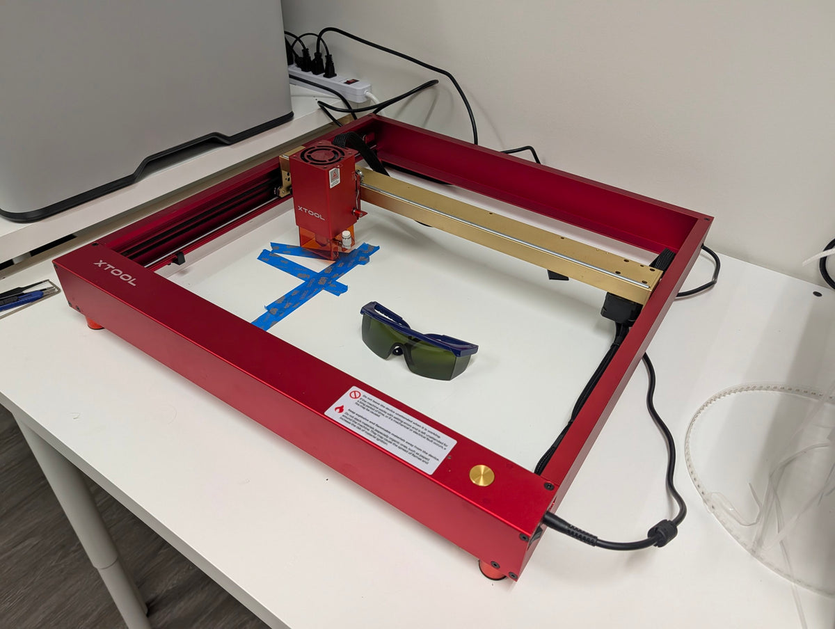 xTool D1 Pro 10W laser module and gold gantry, side view